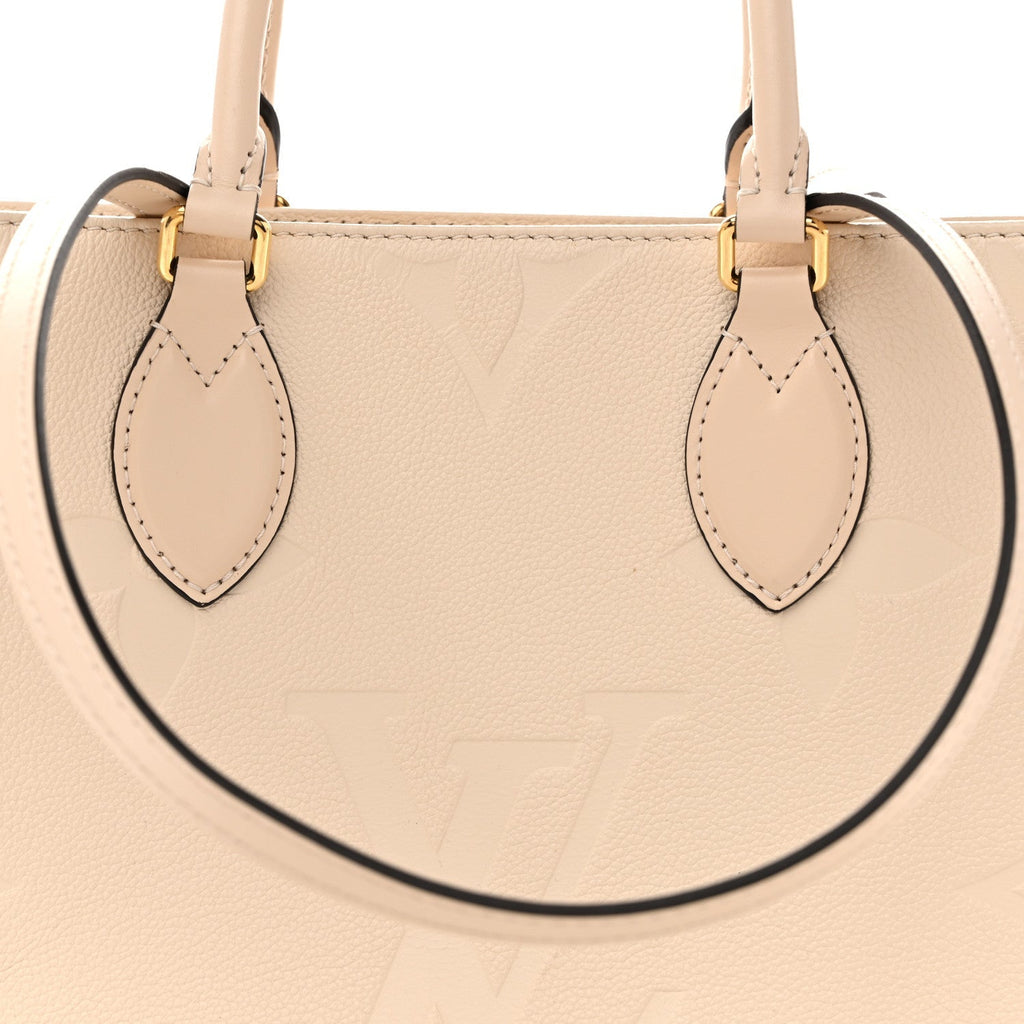 Empreinte Monogram Giant Onthego MM Creme